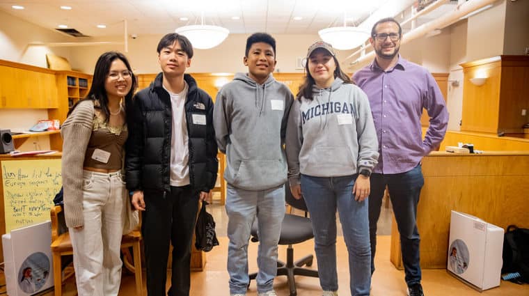 Alumni with students